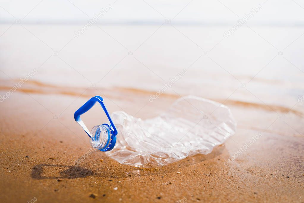 wasted plastic bottle on beach