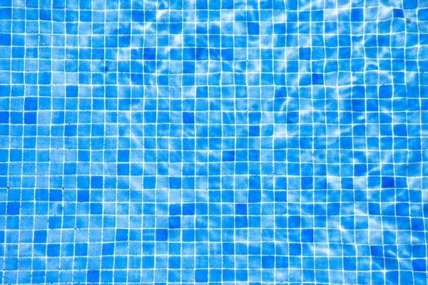 Water and blue tile in swimming pool — Stock Photo, Image