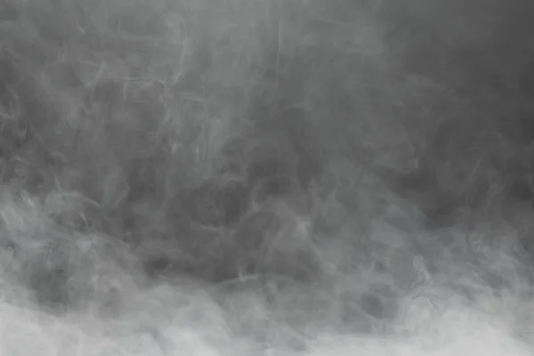 Dichter Rauch auf schwarzem Hintergrund — Stockfoto