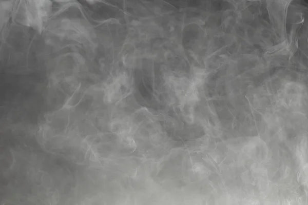 Hustý kouř na černém pozadí — Stock fotografie