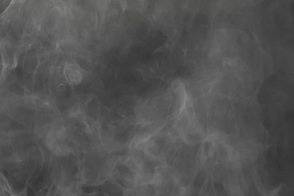 Dense smoke on black background — Stock Photo, Image