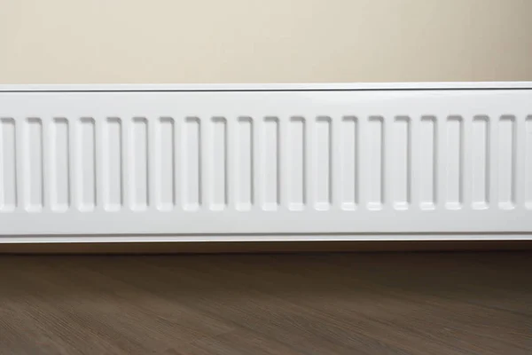 Heating radiator in the living room — Stock Photo, Image