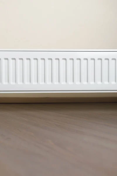 Heating radiator in the living room — Stock Photo, Image