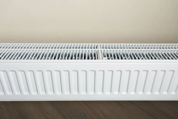 Heating radiator in the living room — Stock Photo, Image