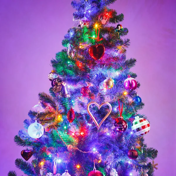 Christmas tree with multicolor led lights, close-up view — Stock Photo, Image