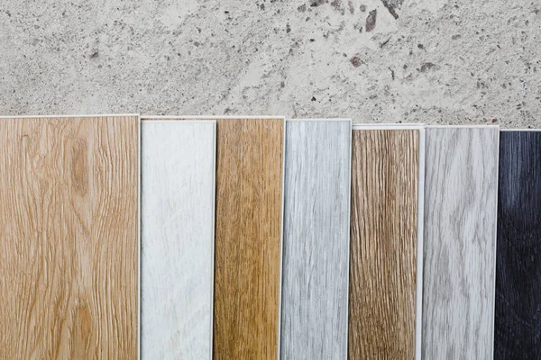 Laminate Flooring Planks Variations Concrete Floor — Stock Photo, Image