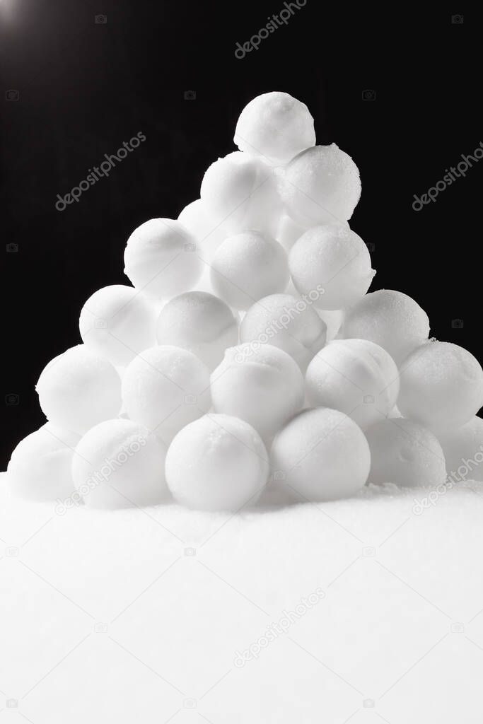snowballs heap on black background