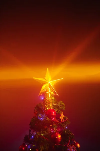 Christmas Tree Festive Lights Orange Background Mist — Stock Photo, Image