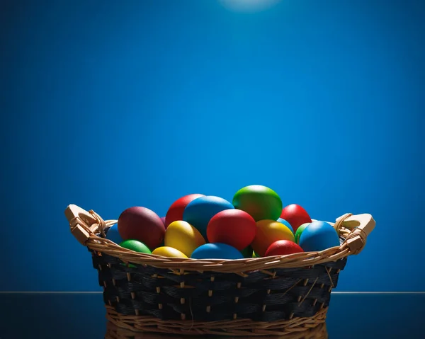 Easter Color Eggs Festive Gift Basket Blue Background Copy Space — Stock Photo, Image