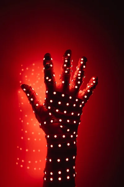Ludzka Ręka Pokryta Czerwonymi Diodami Led Podświetlane Tło — Zdjęcie stockowe