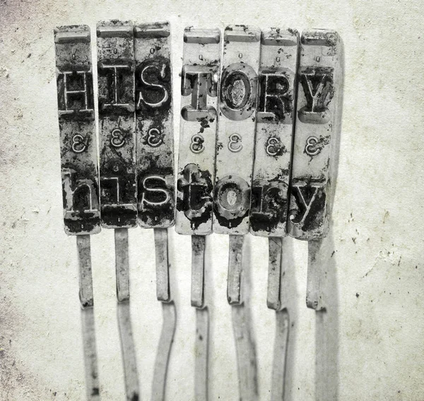 Word History Old Typewriter Hammers Old Paper Background Macro Image — Stock Photo, Image