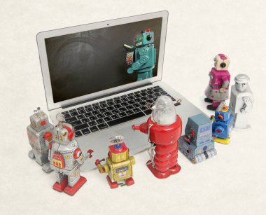 Retro robotlar izole öğrenmek için bir dizüstü bilgisayar toplamak 