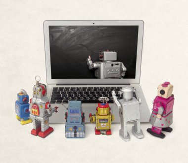 Makine öğrenme kavramı ile izole bir dizüstü bilgisayar, retro robotlar 