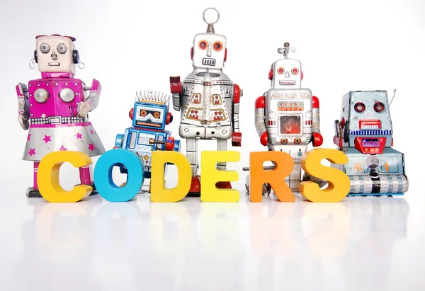 Das Wort Codierer Mit Retro Roboterspielzeug Auf Weiß — Stockfoto