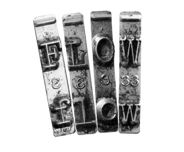 La palabra FLOW con vieja máquina de escribir en monocromo i — Foto de Stock