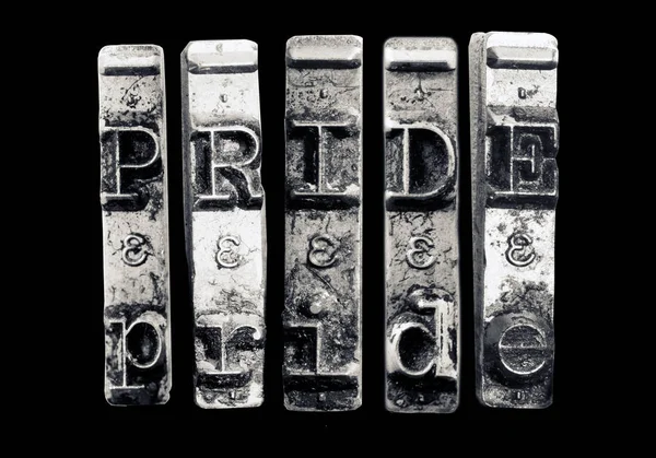 The word PRIDE  with old typewriter hammers — Stock Photo, Image