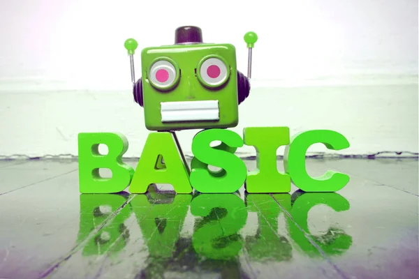 Robot head and the word BASIC — Stock Photo, Image
