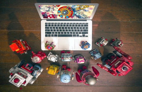Robôs assistindo um fi fi flilm si em um laptop — Fotografia de Stock