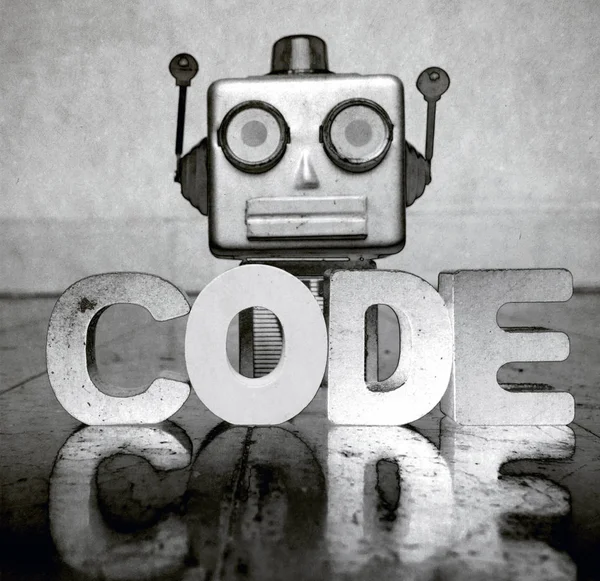 grity robot head and the word CODE
