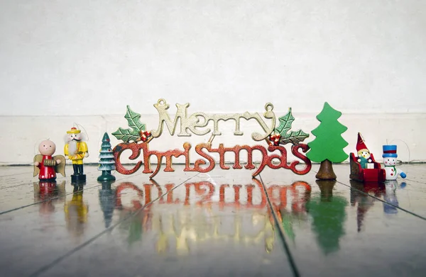Merry Chrismastmas sign on a old wooden floor — Stock Photo, Image