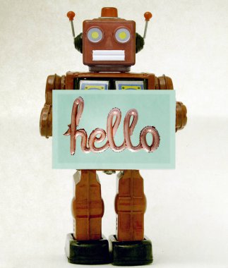 Kırmızı retro robot bir merhaba işareti deliğinde 