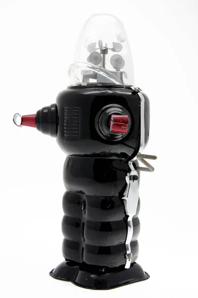 Black retro robot toy isolated — Stock Photo, Image