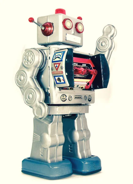 Robot de plata retro está saludando aislado —  Fotos de Stock