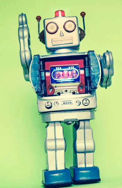 Waving retro robot with a green background — Stock Photo, Image