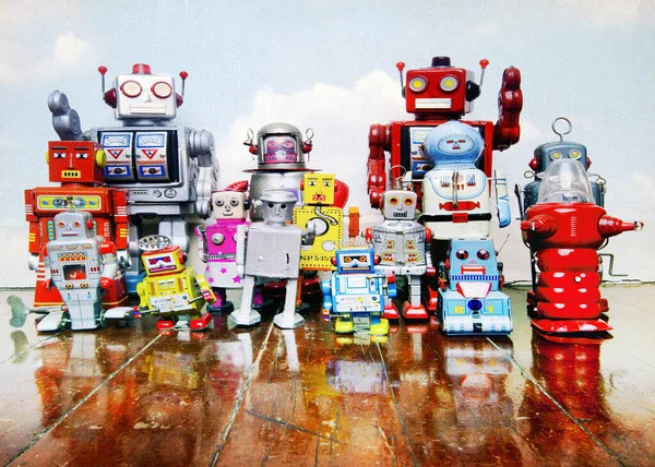 Large Group Retro Tin Robot Toys Old Wooden Floor Reflection — Stock Photo, Image