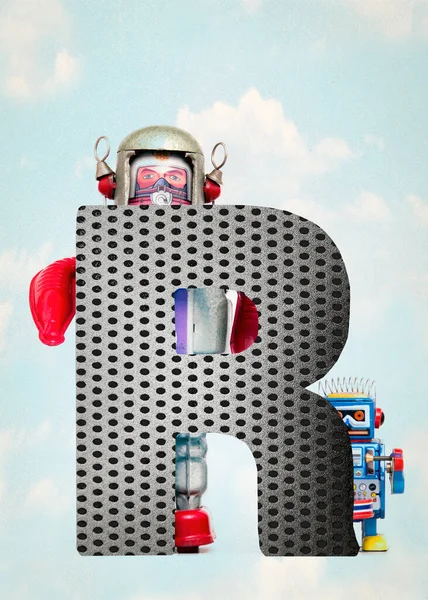 Retro Roboterspielzeug Hält Einen Großen Buchstaben Hoch — Stockfoto