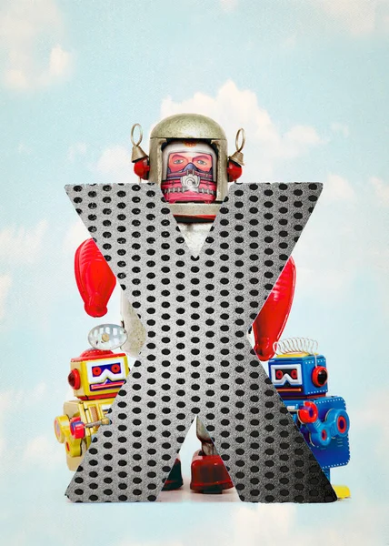 Retro Robot Toys Holding Big Letter — Stock Photo, Image