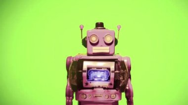 Yeşil ekranlı retro pembe robot oyuncağı Evet hayır salla