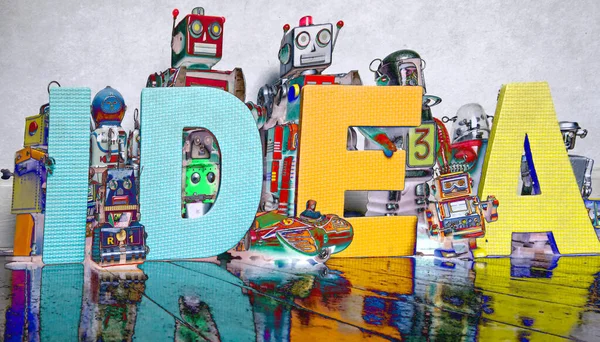 Het Woord Idea Houten Vloer Met Reto Robots Gesolariseerd — Stockfoto