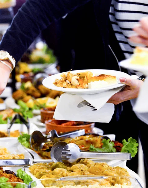 various catering and party food on a table ready to eat, image