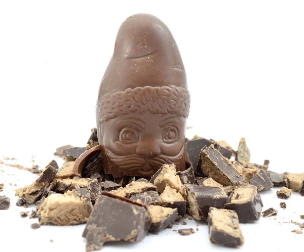 サンタ クロースのチョコレートとヘーゼル ナッツ クリームいっぱいチョコレートの部分 — ストック写真