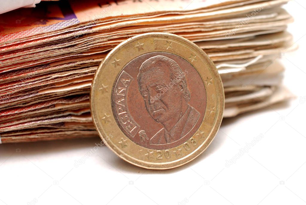 two euro coin on a banknote background, image of a