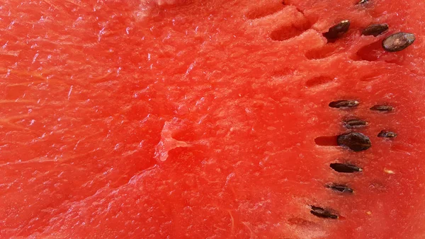 Watermelon with seeds, texture, close up — Stock Photo, Image