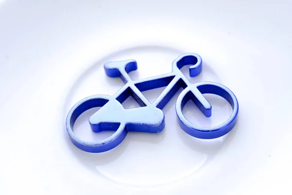 blue bike toy on white background image of a