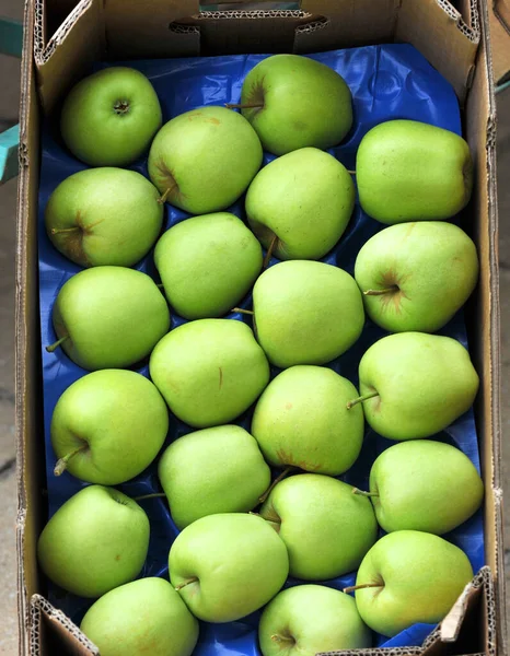 ripe apples display for sale on a farmers market image