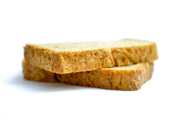 Fatias de pão em um fundo branco — Fotografia de Stock