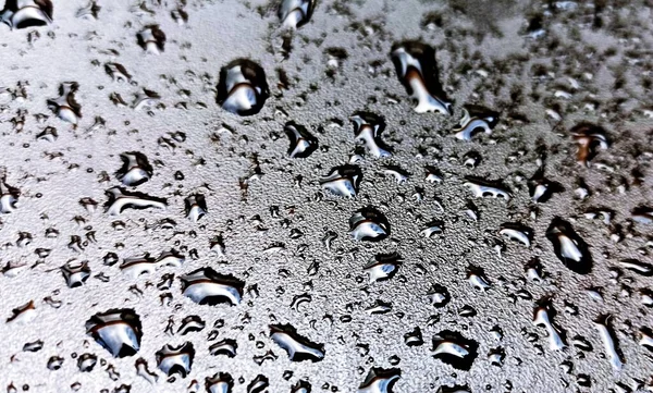 Gotas Lluvia Sobre Imagen Superficial Plástico Negro — Foto de Stock