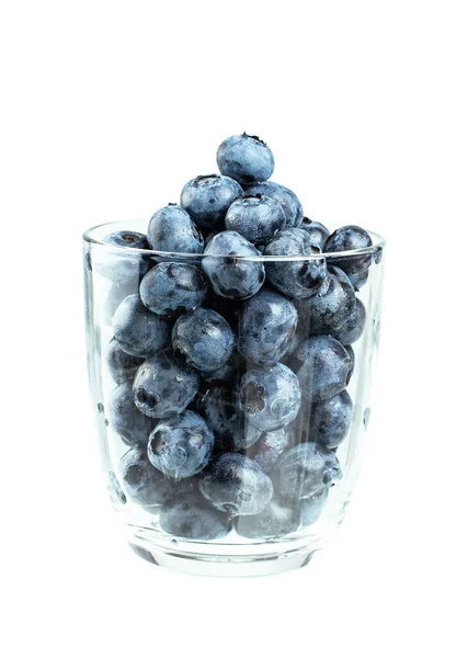 Parçalanmış bardakta taze yaban mersini.