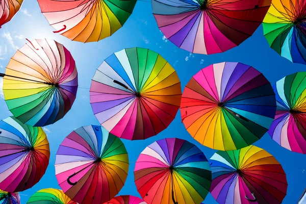 Many colorful umbrellas. Rainbow gay pride protection — Stock Photo, Image