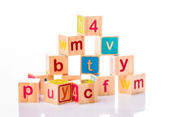 Cubos de brinquedo. Coleção de bebés. ABC cartas feitas de brinquedos de bebê — Fotografia de Stock