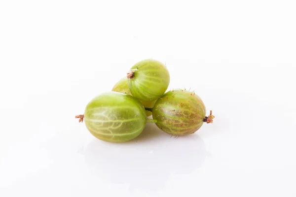 Heap of green gooseberries isolated on white background — Stock Photo, Image