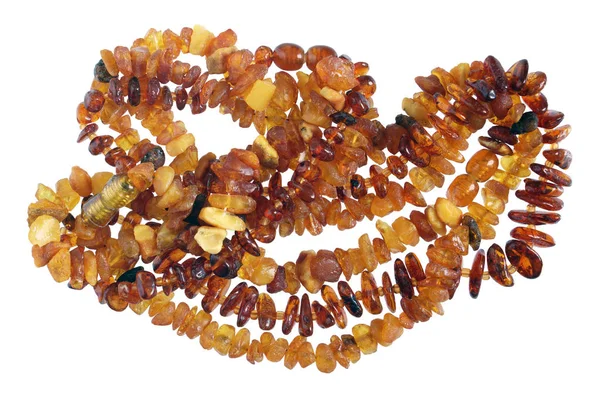 自制的女性珠子是由简单粗糙 金色波罗的海琥珀宝石 查出白色微距镜头 — 图库照片
