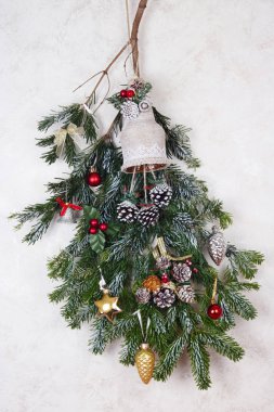 Christmas  homemade wreath  ??from fir tree  branches hang on rural home wall