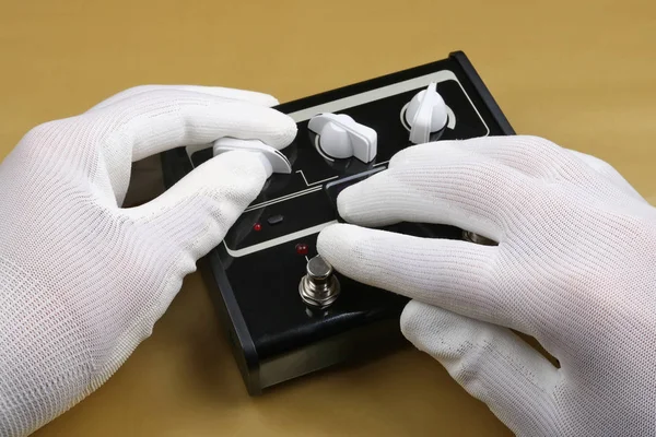 Technician Checks Black Electrical Box Switches Regulators Studio Industrial Concept — Stock Photo, Image