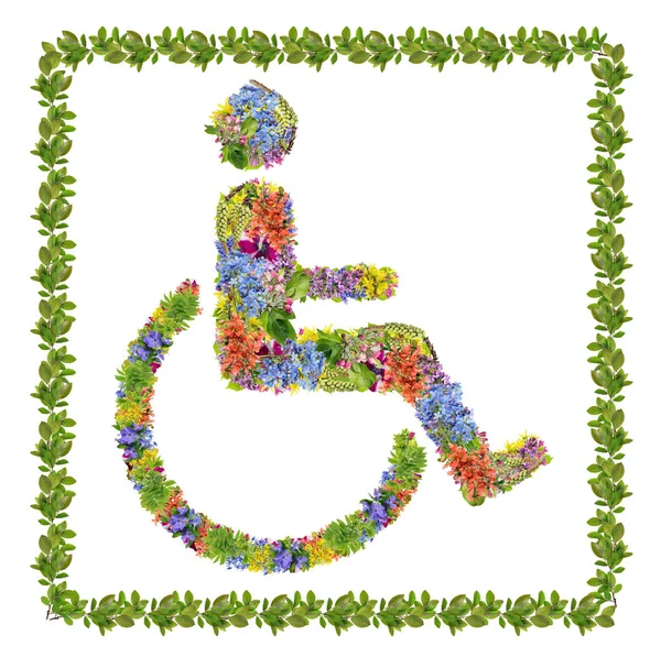 Bahar çiçekleri ve bitki yapılmış bir tekerlekli sandalye sembol kişi — Stok fotoğraf