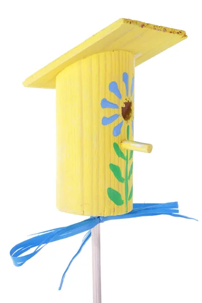 Yellow spring  homemade wooden  small  birdhouse isolated macro — Stock Photo, Image